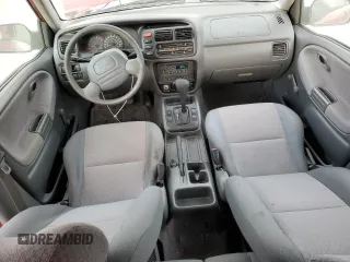 2000 Chevrolet Tracker z VIN 2CNBE13C4Y6944341, wystawiony jako Copart lot #81930714 z przebiegiem 109 501 mil mil oraz Szkoda całkowita • Salvage title. Historia ofert i sprzedaży dostępna na DreamBid. Obrazek 8.