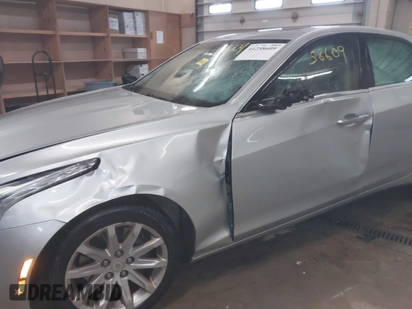 2014 Cadillac CTS Luxury AWD with VIN 1G6AX5S3XE0158960, listed as a IAAI auction lot 41258609 with 84,360 mi miles and . Bid and sale history available at DreamBid. Image 6.