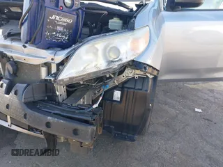 2015 Toyota Sienna L with VIN 5TDZK3DCXFS594786, listed as a IAAI auction lot 42292618 with 180,119 mi miles and . Bid and sale history available at DreamBid. Image 6.