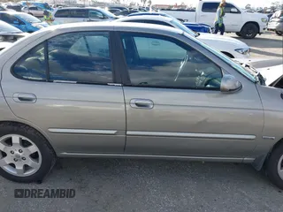 2006 Nissan Sentra S z VIN 3N1CB51D56L514396, wystawiony jako IAAI lot #41591034 z przebiegiem 350 322 mil mil oraz . Historia ofert i sprzedaży dostępna na DreamBid. Obrazek 14.