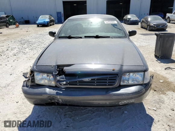 2004 Ford Crown Victoria LX z VIN 2FAFP74W44X112942, wystawiony jako Copart lot #50484665 z przebiegiem 248 480 mil mil oraz Szkoda całkowita • Salvage title. Historia ofert i sprzedaży dostępna na DreamBid. Obrazek 5.