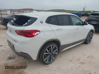 2018 BMW X2 xDrive28i z VIN WBXYJ5C31JEF82624, wystawiony jako IAAI lot #42066439 z przebiegiem 79 454 mil mil oraz . Historia ofert i sprzedaży dostępna na DreamBid. Obrazek 4.