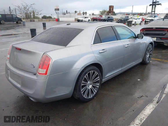 2013 Chrysler 300 with VIN 2C3CCABG3DH736120, listed as a IAAI auction lot 41765794 with 126,268 mi miles. Bid and sale history available at carsss.com. Image 4.
