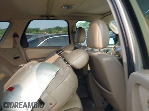 2005 Mercury Mariner Luxury with VIN 4M2YU57105DJ32592, listed as a IAAI auction lot 42433116 with Not provided miles and . Bid and sale history available at DreamBid. Image 8.