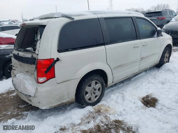 2012 Dodge Grand Caravan SE with VIN 2C4RDGBG2CR419489, listed as a IAAI auction lot 41270114 with 124,869 mi miles. Bid and sale history available at carsss.com. Image 4.