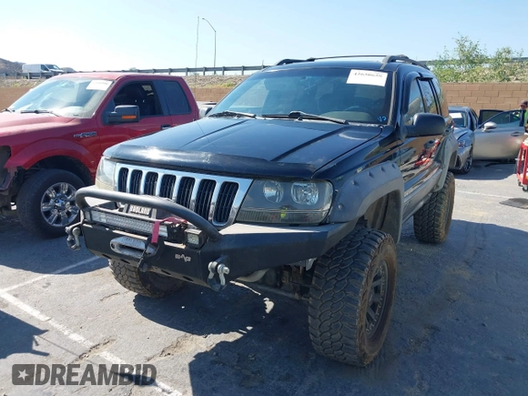 2000 Jeep Grand Cherokee Laredo with VIN 1J4GW48N0YC204645, listed as a IAAI auction lot 42650659 with 217,851 mi miles and . Bid and sale history available at DreamBid. Image 2.