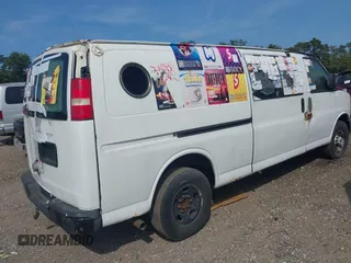 2005 Chevrolet Express Cargo Van with VIN 1GCGG29VX51200468, listed as a IAAI auction lot 40363424 with 999,999 mi miles. Bid and sale history available at carsss.com. Image 4.
