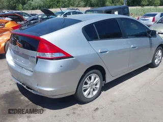 2010 Honda Insight EX with VIN JHMZE2H74AS041533, listed as a IAAI auction lot 42675766 with 203,357 mi miles and . Bid and sale history available at DreamBid. Image 4.
