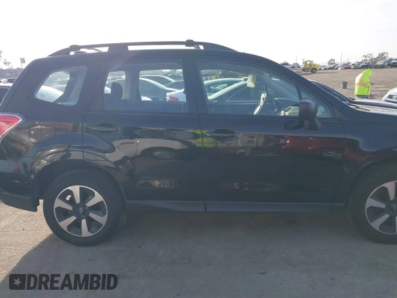 2017 Subaru Forester with VIN JF2SJABCXHH589978, listed as a IAAI auction lot 41582893 with 34,336 mi miles and . Bid and sale history available at DreamBid. Image 14.