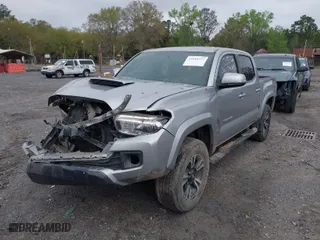 2017 Toyota Tacoma SR5 with VIN 5TFAZ5CN3HX035326, listed as a IAAI auction lot 41940372 with 284,065 mi miles. Bid and sale history available at carsss.com. Image 2.