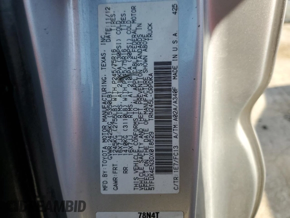2013 Toyota Tacoma z VIN 5TFUX4EN3DX018529, wystawiony jako Copart lot #77794934 z przebiegiem 186 050 mil mil oraz Szkoda całkowita • Salvage title. Historia ofert i sprzedaży dostępna na DreamBid. Obrazek 12.