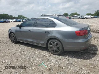 2014 Volkswagen Jetta SE z VIN 3VWD07AJ7EM395250, wystawiony jako Copart lot #65821005 z przebiegiem 155 293 mil mil oraz Czysty tytuł • Clean title. Historia ofert i sprzedaży dostępna na DreamBid. Obrazek 2.