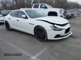 2014 Maserati Ghibli S Q4 with VIN ZAM57RTA9E1088666, listed as a IAAI auction lot 41490459 with 42,459 mi miles and . Bid and sale history available at DreamBid. Image 1.