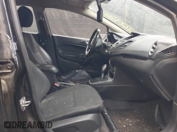 2015 Ford Fiesta SE with VIN 3FADP4BJ1FM133520, listed as a IAAI auction lot 42229311 with 174,734 mi miles and . Bid and sale history available at DreamBid. Image 5.