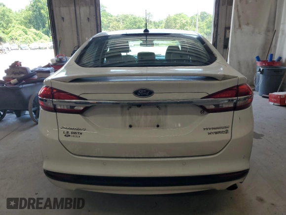 2017 Ford Fusion Hybrid Titanium z VIN 3FA6P0RU3HR400034, wystawiony jako Copart lot #62689795 z przebiegiem 109 118 mil mil oraz Szkoda całkowita • Salvage title. Historia ofert i sprzedaży dostępna na DreamBid. Obrazek 6.