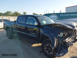 2016 Toyota Tacoma SR5 with VIN 3TMDZ5BN8GM004995, listed as a IAAI auction lot 41979497 with 91,227 mi miles. Bid and sale history available at carsss.com. Image 13.