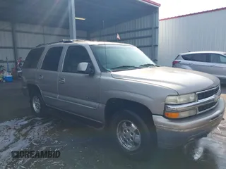 2001 Chevrolet Tahoe LS z VIN 1GNEC13T71J124102, wystawiony jako IAAI lot #41494688 z przebiegiem 248 890 mil mil oraz . Historia ofert i sprzedaży dostępna na DreamBid. Obrazek 1.