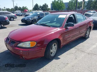 1999 Pontiac Grand Am SE2 with VIN 1G2NE52T0XM702788, listed as a IAAI auction lot 42564414 with 195,067 mi miles and . Bid and sale history available at DreamBid. Image 2.