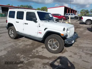 2021 Jeep Wrangler Unlimited Sahara with VIN 1C4HJXEN9MW506930, listed as a IAAI auction lot 42571985 with 39,031 mi miles and . Bid and sale history available at DreamBid. Image 1.