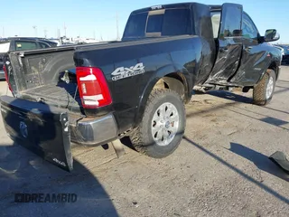 2021 Ram 2500 Laramie with VIN 3C6UR5NL5MG515382, listed as a IAAI auction lot 41735822 with 65,613 mi miles. Bid and sale history available at carsss.com. Image 4.