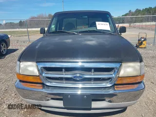 1999 Ford Ranger XL with VIN 1FTYR10C1XTA97856, listed as a IAAI auction lot 41505830 with 126,950 mi miles. Bid and sale history available at carsss.com. Image 6.