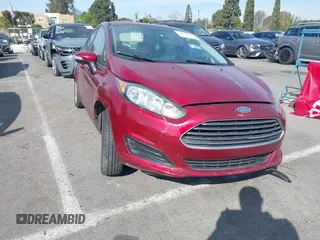 2015 Ford Fiesta SE with VIN 3FADP4BJ9FM113760, listed as a IAAI auction lot 41647960 with 122,868 mi miles. Bid and sale history available at carsss.com. Image 1.