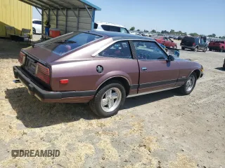 1982 Datsun 280ZX 2+2 z VIN JN1HZ06S5CX429361, wystawiony jako Copart lot #59239365 z przebiegiem 139 002 mil mil oraz Tytuł czysty. Historia ofert i sprzedaży dostępna na DreamBid. Obrazek 3.