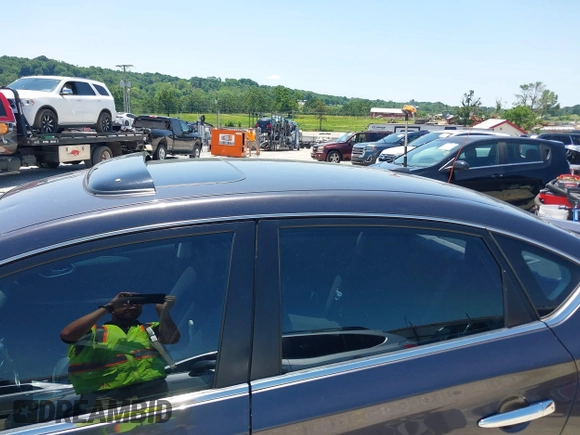 2014 Nissan Sentra SV with VIN 3N1AB7AP2EY235731, listed as a IAAI auction lot 42385925 with 98,692 mi miles and . Bid and sale history available at DreamBid. Image 6.