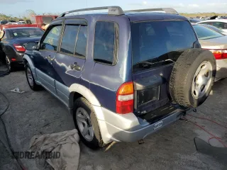 2003 Suzuki Grand Vitara z VIN JS3TE62V534100751, wystawiony jako Copart lot #76714894 z przebiegiem Nie podano mil oraz Nie do naprawy • Non repairable. Historia ofert i sprzedaży dostępna na DreamBid. Obrazek 2.