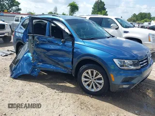 2018 Volkswagen Tiguan S with VIN 3VV1B7AX0JM028674, listed as a IAAI auction lot 42558427 with 104,562 mi miles and . Bid and sale history available at DreamBid. Image 1.