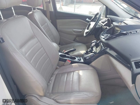 2014 Ford Escape Titanium with VIN 1FMCU9JXXEUC18993, listed as a IAAI auction lot 41802872 with 124,995 mi miles. Bid and sale history available at carsss.com. Image 5.