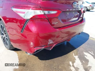 2018 Toyota Camry LE z VIN 4T1B11HK9JU583160, wystawiony jako IAAI lot #41707215 z przebiegiem 134 214 mil mil oraz . Historia ofert i sprzedaży dostępna na DreamBid. Obrazek 19.