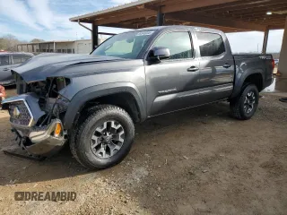 2018 Toyota Tacoma SR z VIN 3TMCZ5AN8JM183723, wystawiony jako Copart lot #89346205 z przebiegiem 169 854 mil mil oraz Szkoda całkowita • Salvage title. Historia ofert i sprzedaży dostępna na DreamBid. Obrazek 1.