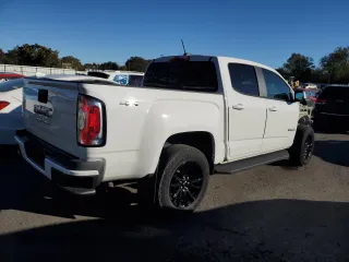 2021 GMC Canyon 4WD Elevation with VIN 1GTG6CEN4M1255429, listed as a Copart auction lot 75217524 with 21,958 mi miles and Salvage Title. Bid and sale history available at carsss.com. Image 3.
