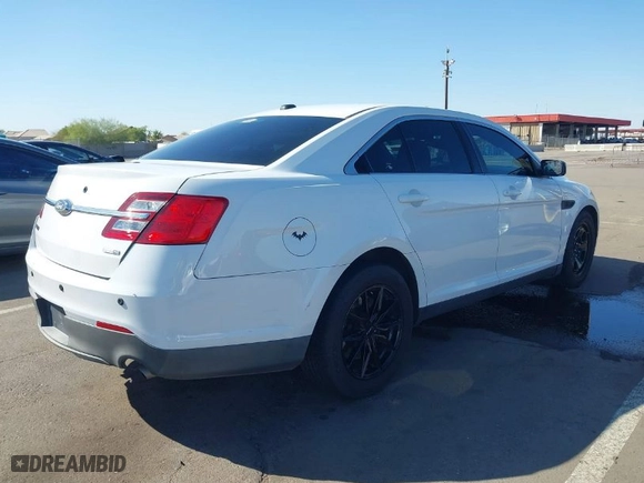 2013 Ford Sedan Police Interceptor with VIN 1FAHP2M82DG132383, listed as a IAAI auction lot 41851540 with 172,639 mi miles. Bid and sale history available at carsss.com. Image 4.