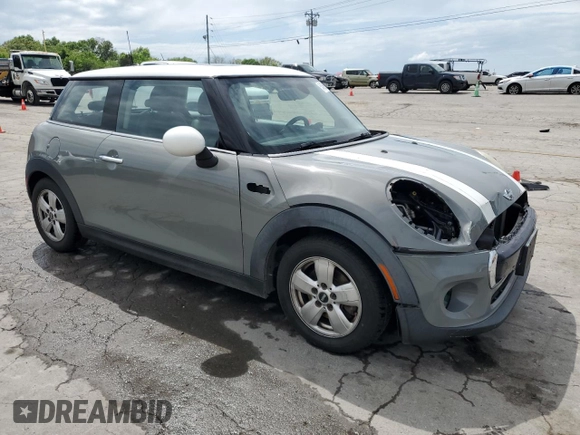 2017 MINI Hardtop Cooper with VIN WMWXP5C50H3B77981, listed as a Copart auction lot 54596525 with 99,393 mi miles and Salvage Title. Bid and sale history available at DreamBid. Image 4.