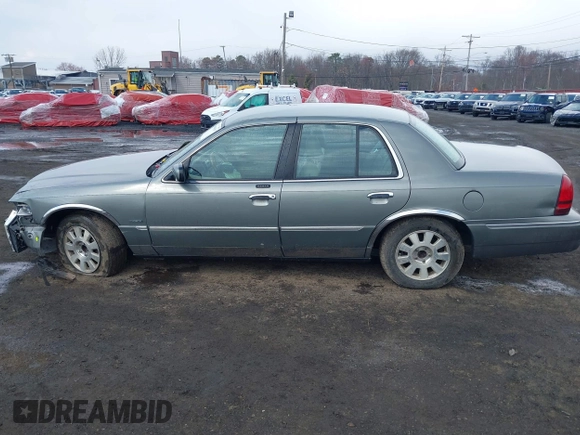 2003 Mercury Grand Marquis LS Premium with VIN 2MEFM75WX3X634344, listed as a IAAI auction lot 41888397 with 129,651 mi miles and . Bid and sale history available at DreamBid. Image 14.