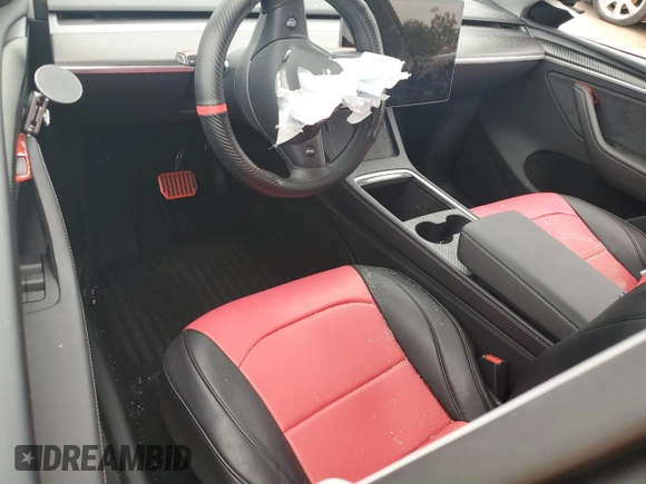 2024 Tesla Model Y z VIN 7SAYGDED4RA331714, wystawiony jako Copart lot #57043915 z przebiegiem Nie podano mil oraz Szkoda całkowita • Salvage title. Historia ofert i sprzedaży dostępna na DreamBid. Obrazek 8.