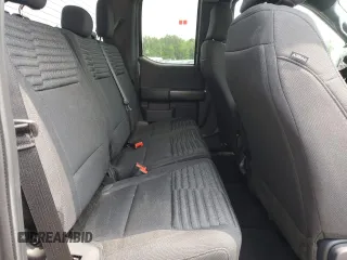2023 Ford F-150 XL with VIN 1FTEX1EP9PKE34381, listed as a Copart auction lot 63938505 with 13,933 mi miles and Salvage title. Bid and sale history available at DreamBid. Image 10.