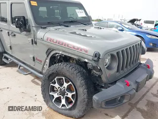 2020 Jeep Wrangler Unlimited Rubicon z VIN 1C4HJXFG2LW267154, wystawiony jako IAAI lot #41745497 z przebiegiem 28 692 mil mil oraz . Historia ofert i sprzedaży dostępna na DreamBid. Obrazek 6.