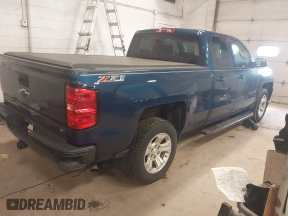 2017 Chevrolet Silverado 1500 LT with VIN 1GCVKREC1HZ136247, listed as a IAAI auction lot 42081569 with 123,906 mi miles and . Bid and sale history available at DreamBid. Image 4.