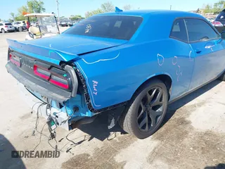 2015 Dodge Challenger SXT Plus with VIN 2C3CDZBG7FH901178, listed as a IAAI auction lot 42220878 with 123,146 mi miles and . Bid and sale history available at DreamBid. Image 6.