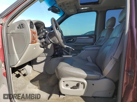 2003 GMC Envoy SLT with VIN 1GKDT13S732378731, listed as a Copart auction lot 88340825 with 125,814 mi miles and Salvage Title. Bid and sale history available at carsss.com. Image 7.