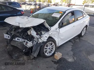 2017 Ford Focus SE with VIN 1FADP3F2XHL300331, listed as a IAAI auction lot 41975453 with Not provided miles and . Bid and sale history available at DreamBid. Image 2.