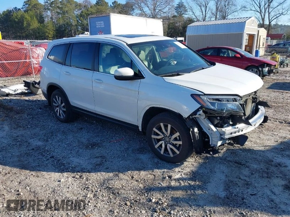 2021 Honda Pilot EX-L with VIN 5FNYF6H52MB062365, listed as a IAAI auction lot 41664771 with 42,393 mi miles. Bid and sale history available at carsss.com. Image 1.