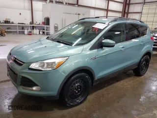 2013 Ford Escape SE with VIN 1FMCU0GX9DUB40739, listed as a IAAI auction lot 41633757 with 87,522 mi miles and . Bid and sale history available at DreamBid. Image 2.
