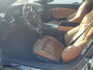 2020 BMW Z4 sDriveM40i with VIN WBAHF9C04LWW40647, listed as a Copart auction lot 77301284 with 0 mi miles and Salvage Title. Bid and sale history available at carsss.com. Image 7.