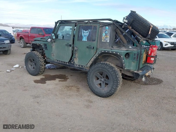2010 Jeep Wrangler Unlimited Sport with VIN 1J4BA3H12AL230749, listed as a IAAI auction lot 41052278 with 156,217 mi miles. Bid and sale history available at carsss.com. Image 3.