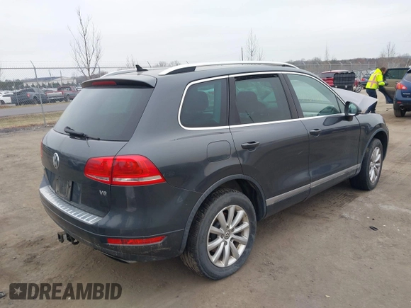 2012 Volkswagen Touareg Sport z VIN WVGEF9BP5CD011717, wystawiony jako IAAI lot #41787614 z przebiegiem 138 127 mil mil oraz . Historia ofert i sprzedaży dostępna na DreamBid. Obrazek 4.