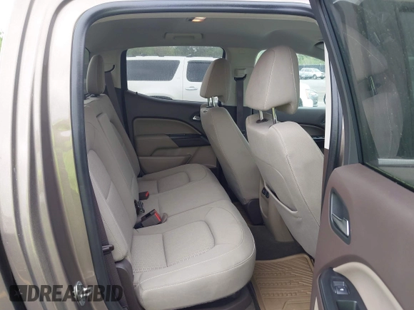 2015 GMC Canyon 2WD SLE with VIN 1GTG5BE38F1229799, listed as a IAAI auction lot 41944801 with 71,165 mi miles. Bid and sale history available at carsss.com. Image 8.